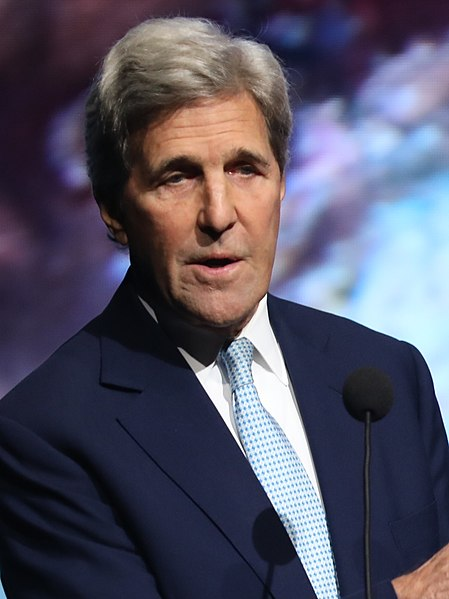 Image of John Kerry speaking at an event.