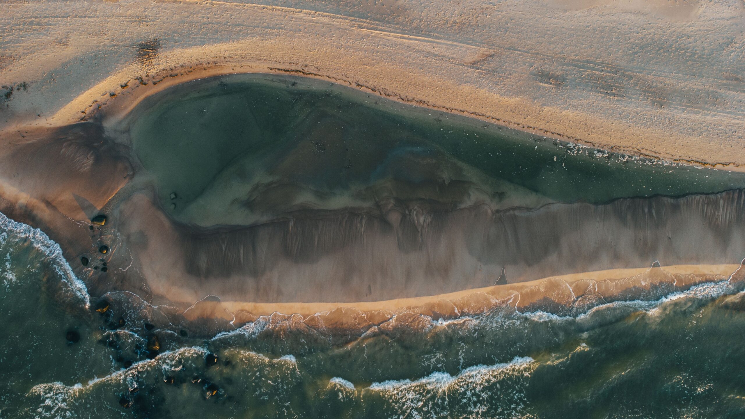aerial view of the sandy seashore at Palanga, Lithuania, showcasing natural beauty.